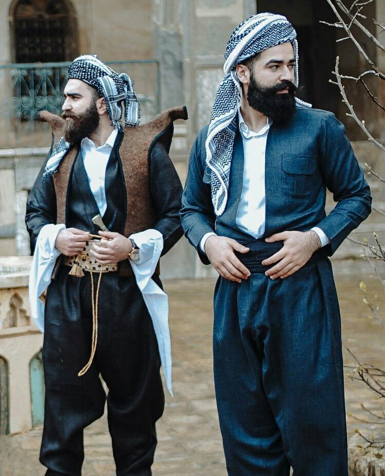 Kurdish Men From Western Iran In Traditional Costumes